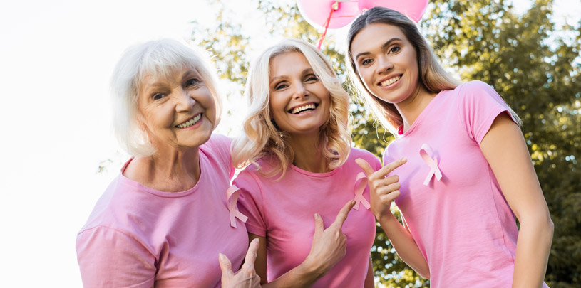 Women wearing pink ribbon